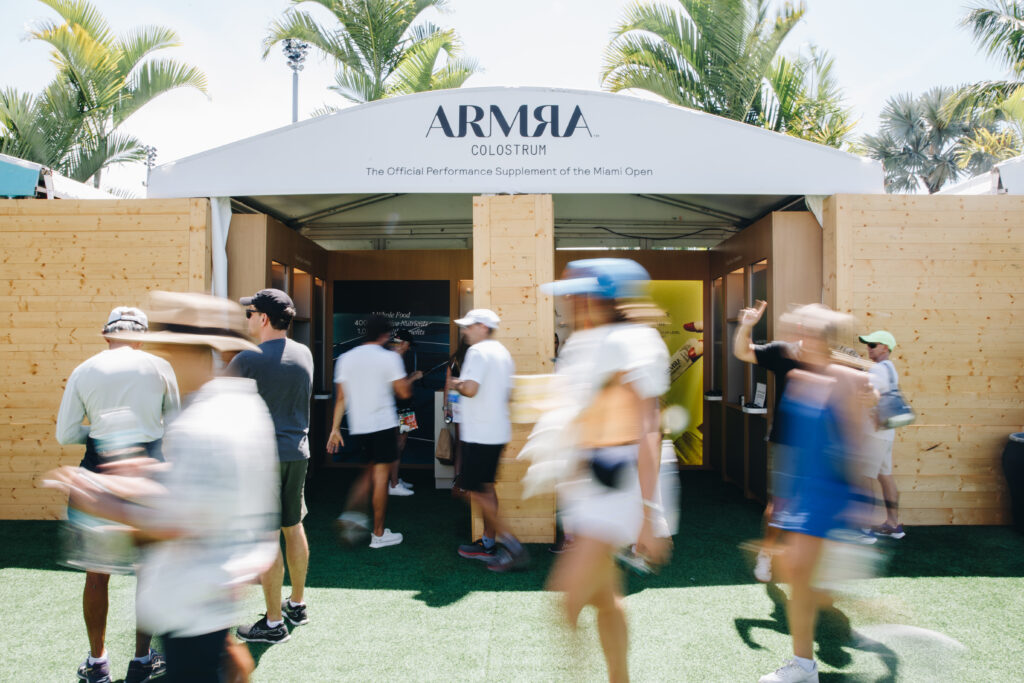 ARMRA locker-room activation at the 2025 Miami Open — stainless-steel lockers filled with tennis balls keyed to wellness benefits.
